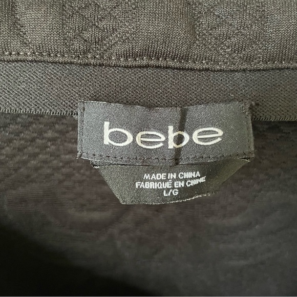 bebe | Embossed Quilted Floral A-line Mini Skirt Black LG - Picture 6 of 10